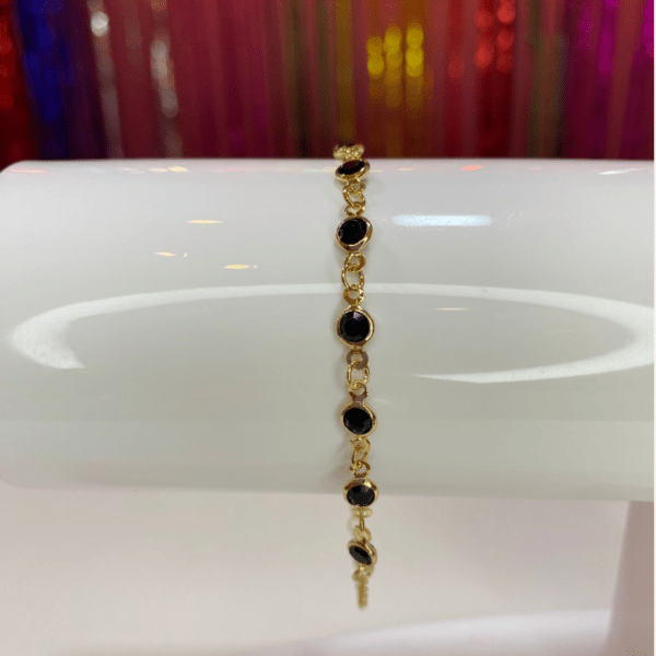 pulseira de cristal (preto) dourada